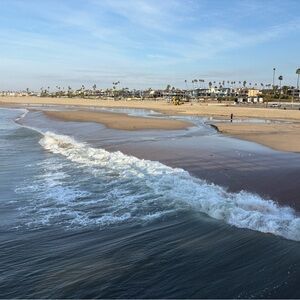 New Tiffany blue slip on pumas with bows